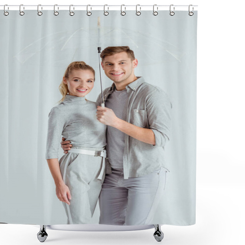 Personality  Beautiful Couple Looking At Camera And Posing Under Transparent Umbrella On Isolated On Grey Shower Curtains