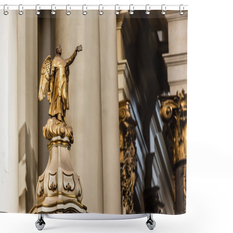 Personality  LVIV, UKRAINE - OCTOBER 23, 2019: Gilded Statue Of Archangel Holding Bible In Outstretched Hand In Dominican Church Shower Curtains