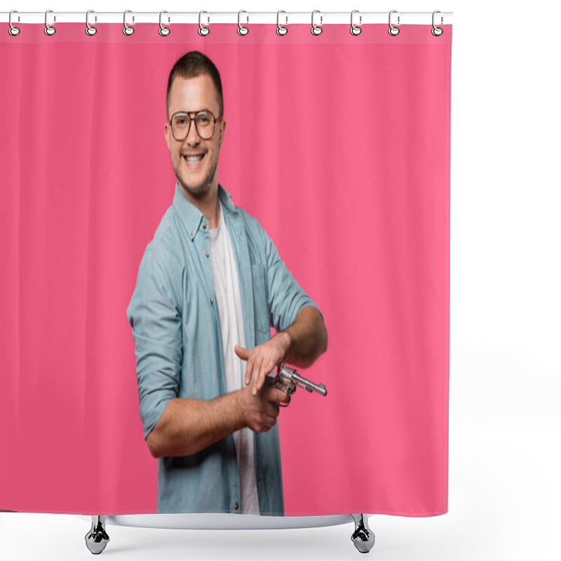 Personality  Young Man In Eyeglasses Holding Revolver And Smiling At Camera Isolated On Pink Shower Curtains