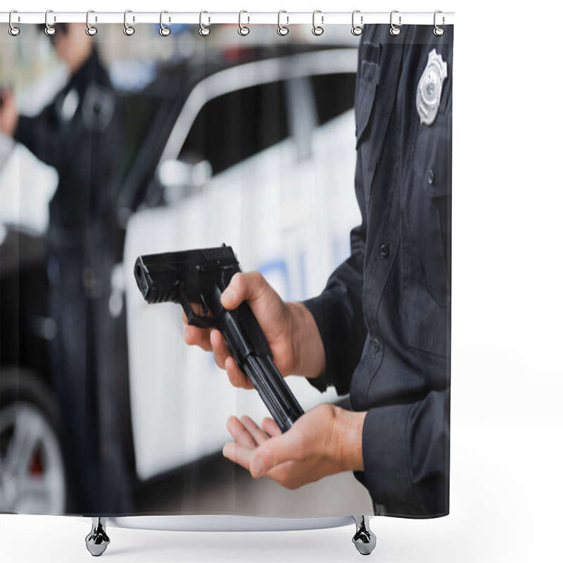 Personality  Cropped View Of Policeman Loading Gun Near Colleague And Police Car On Blurred Background  Shower Curtains