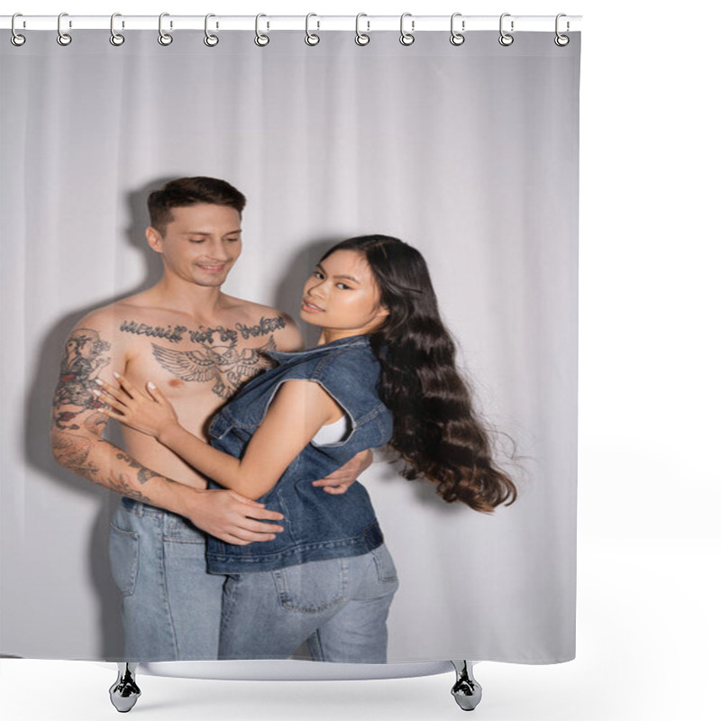 Personality  Muscular Tattooed Man Hugging Brunette Asian Woman Looking At Camera On Grey Background Shower Curtains