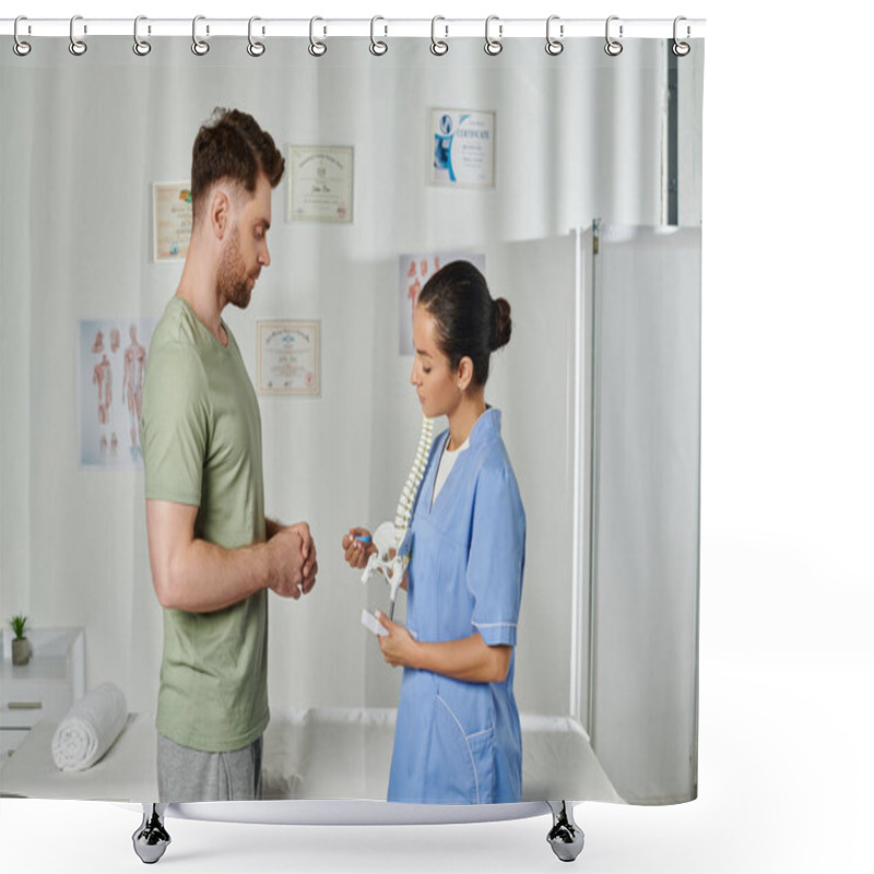 Personality  Good Looking Bearded Patient Looking Attentively At Spine Model In Hands Of His Attractive Doctor Shower Curtains