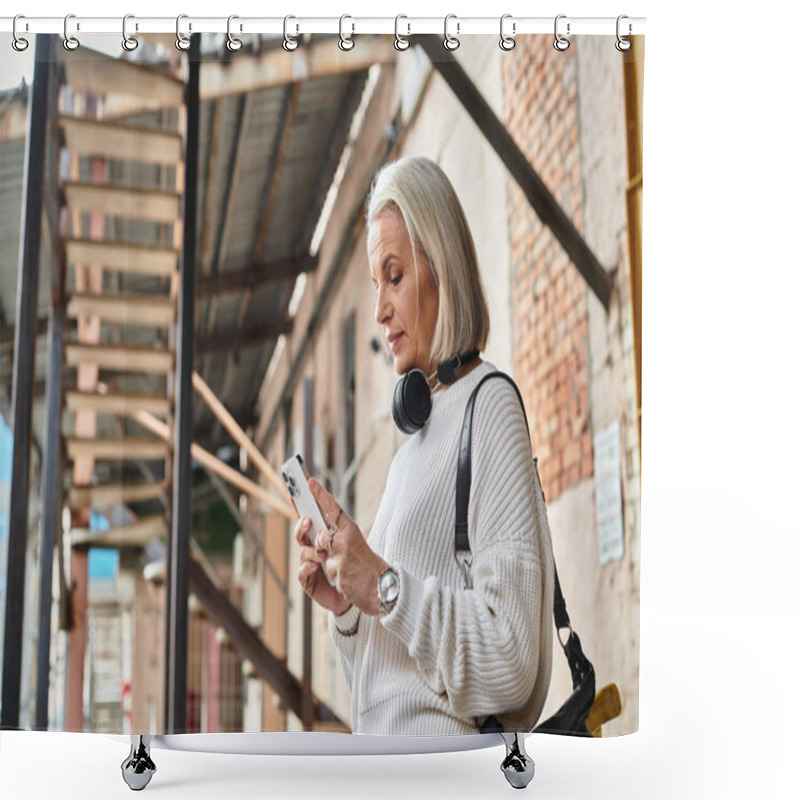 Personality  A Mature Woman With Stunning Gray Hair Uses Her Smartphone In An Urban Environment. Shower Curtains