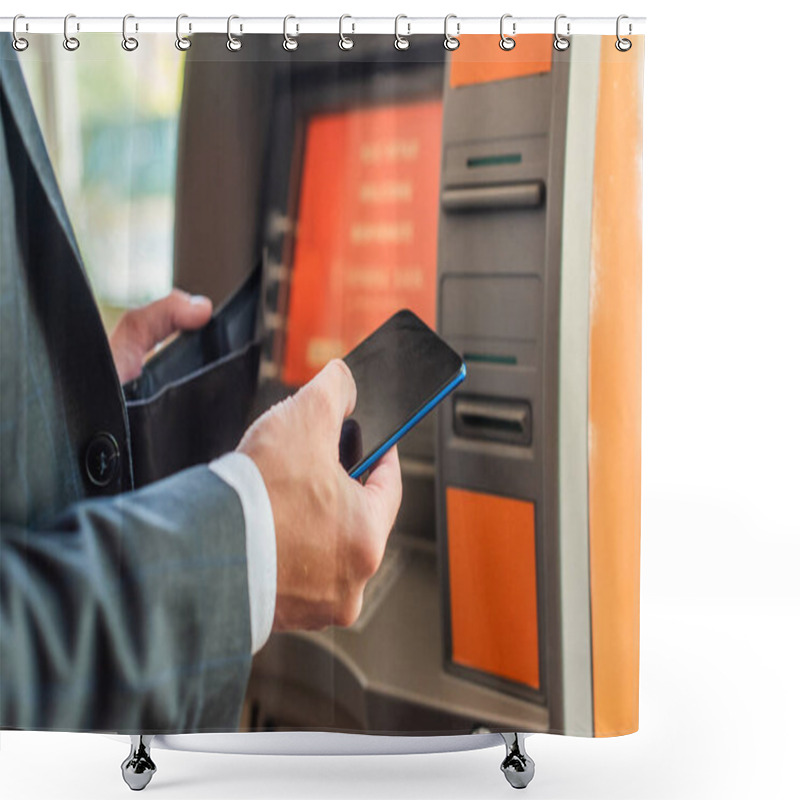 Personality  Cropped View Of Businessman With Empty Wallet And Smartphone Standing Near Atm On Blurred Background Shower Curtains