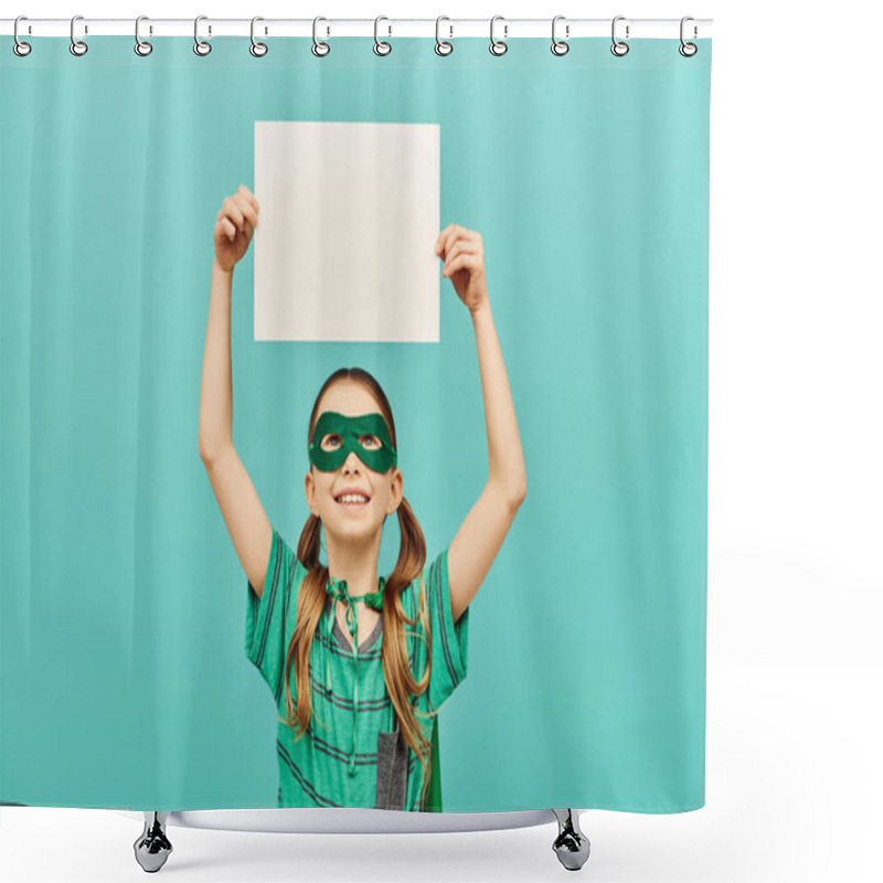 Personality  Happy Preteen Girl In Green Superhero Mask Holding Blank Paper Above Head And Looking Up On Blue Background, World Child Protection Day Concept  Shower Curtains