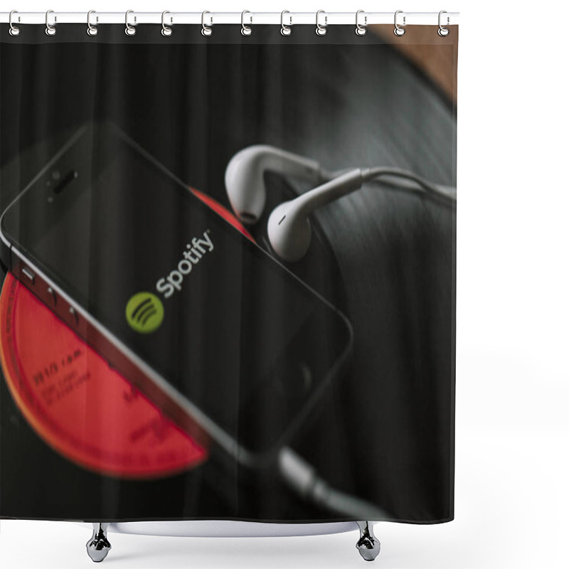 Personality  MALAGA, SPAIN - MARCH 5, 2018: Mobile Phone With Spotify Music Service In The Screen And White Earphones On A Black Vinyl Record. Shower Curtains