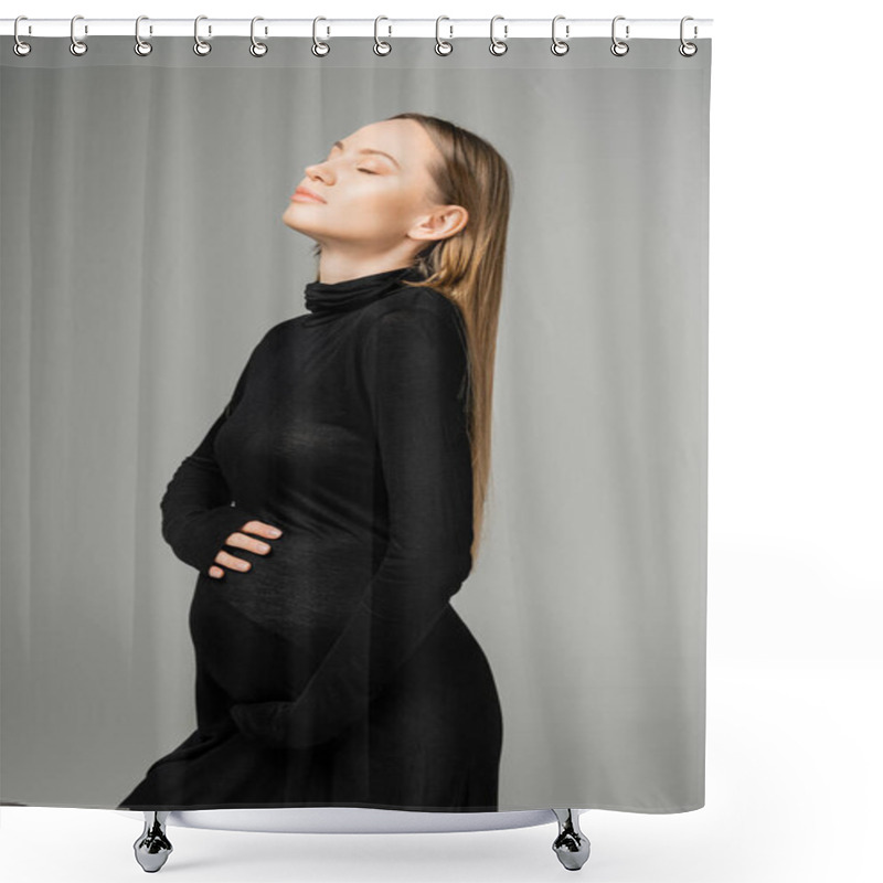 Personality  Portrait Of Long Haired And Pregnant Woman With Natural Makeup Wearing Stylish Black Dress While Touching Belly And Standing With Closed Eyes Isolated On Grey, Growing New Life Concept Shower Curtains