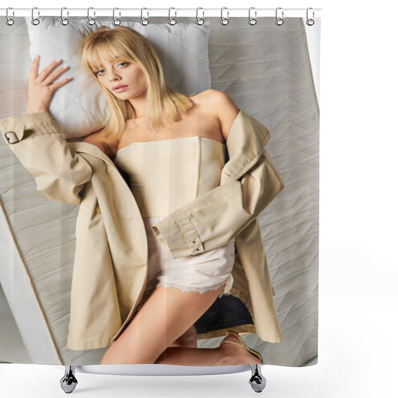 Personality  A woman in cozy attire lies peacefully on a bed next to a pillow. shower curtains