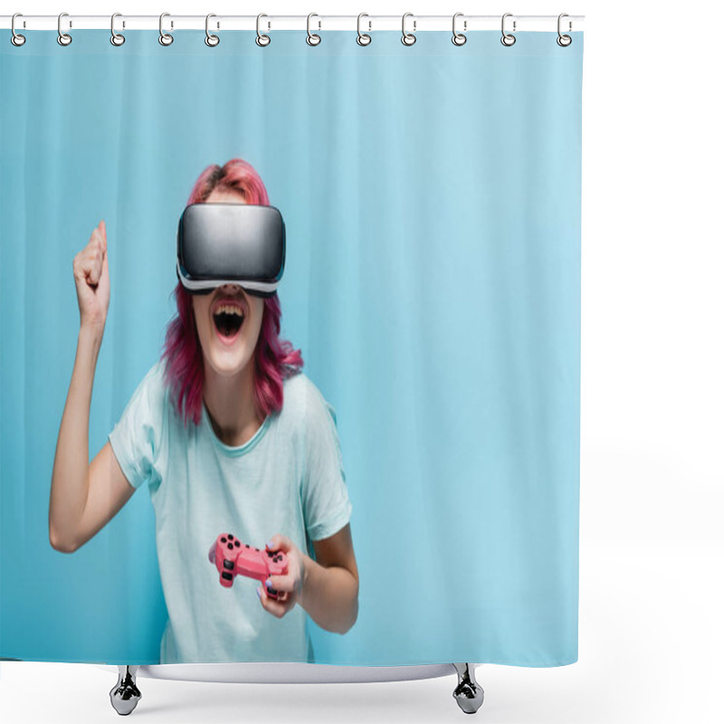 Personality  KYIV, UKRAINE - JULY 29, 2020: Excited Young Woman With Pink Hair In Vr Headset With Joystick On Blue Background Shower Curtains