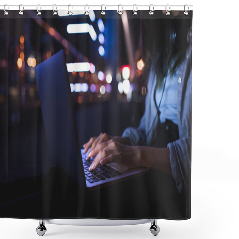 Personality  Cropped Shot Of Woman With Headphones Typing On Laptop On City Street At Night Shower Curtains