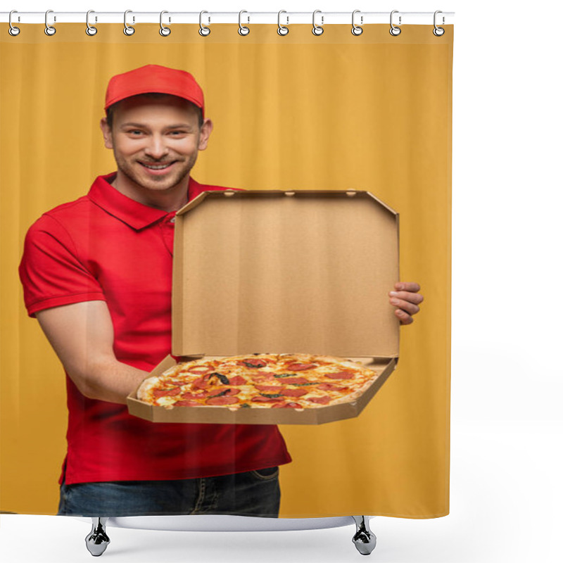 Personality  Happy Delivery Man In Red Uniform Showing Box With Delicious Pizza Isolated On Yellow Shower Curtains