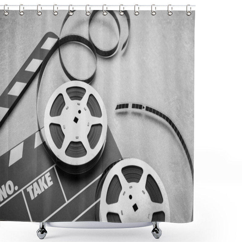 Personality  Movie Clapper And Film Reels On Grey Textured Table, Closeup Shower Curtains