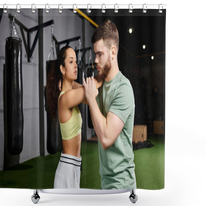 Personality  A Male Trainer Guiding A Woman Through Self-defense Techniques In A Gym. Shower Curtains