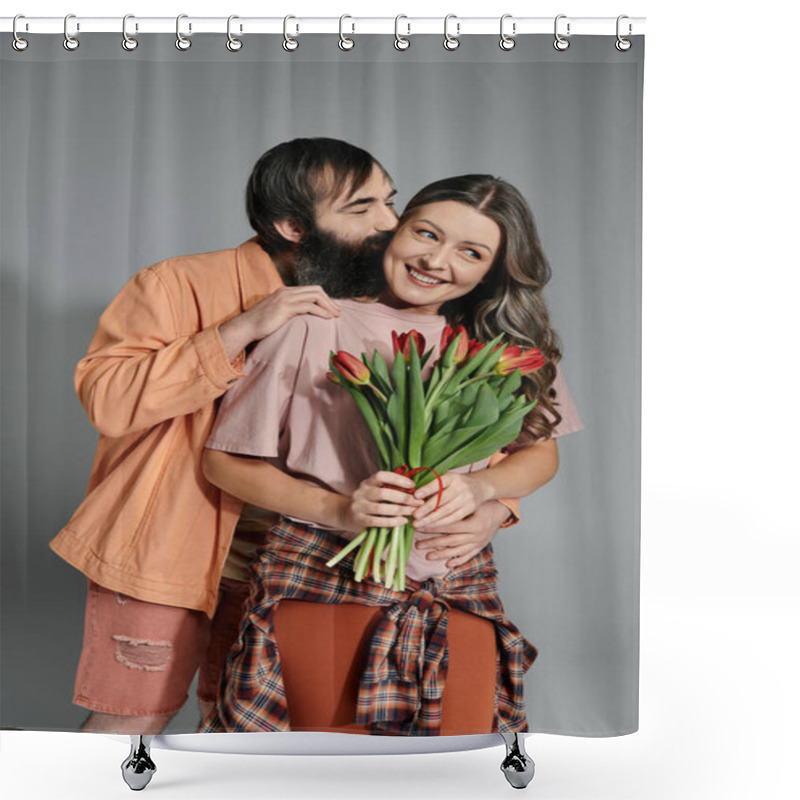 Personality  A Man And Woman In Sophisticated Attire Pose Together In A Studio Setting. The Man Kisses The Woman On The Cheek, And She Holds A Bouquet Of Red Tulips. Shower Curtains