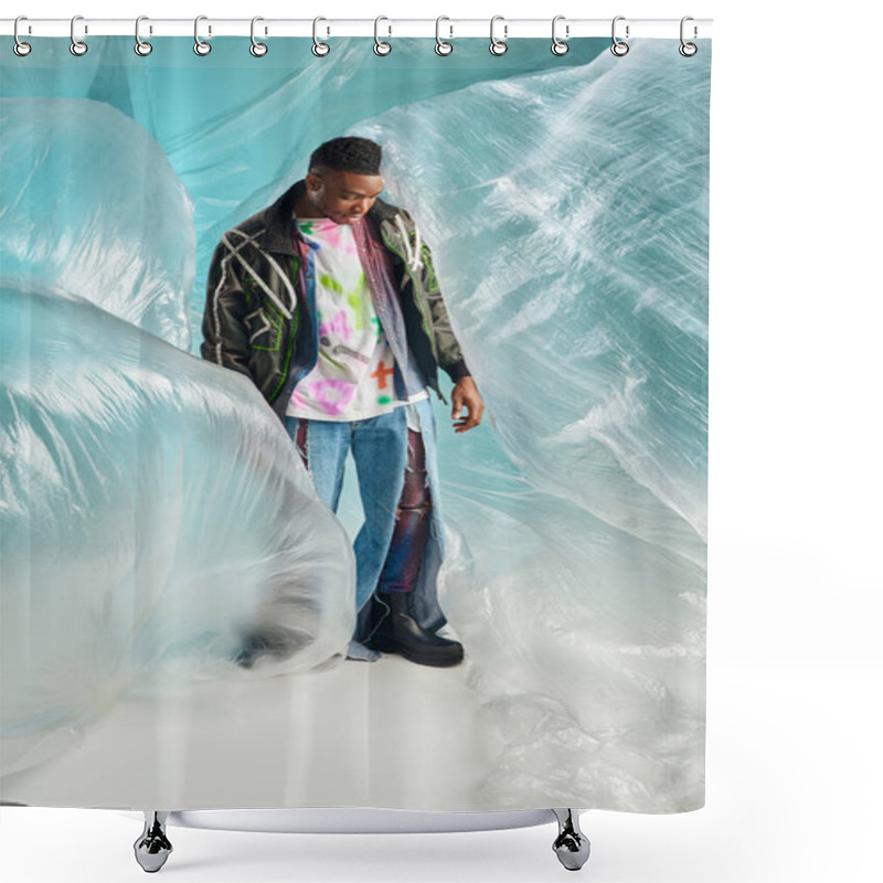 Personality  Full Length Of Fashionable Afroamerican Male Model In Outwear Jacket With Led Stripes And Ripped Jeans Standing Near Cellophane On Turquoise Background, Creative Expression, DIY Clothing  Shower Curtains