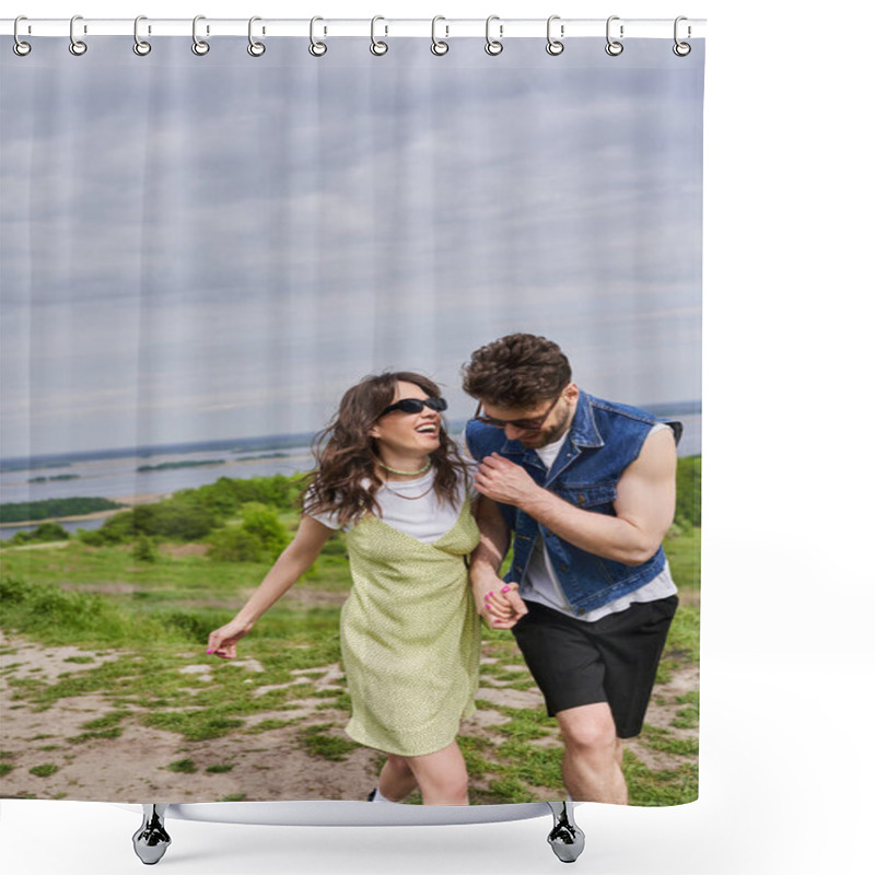 Personality  Cheerful Brunette Man In Stylish Summer Outfit And Denim Vest Holding Hand Of Excited Girlfriend In Sunglasses And Sundress And Walking Together On Path On Grassy Hill, Countryside Leisurely Stroll Shower Curtains