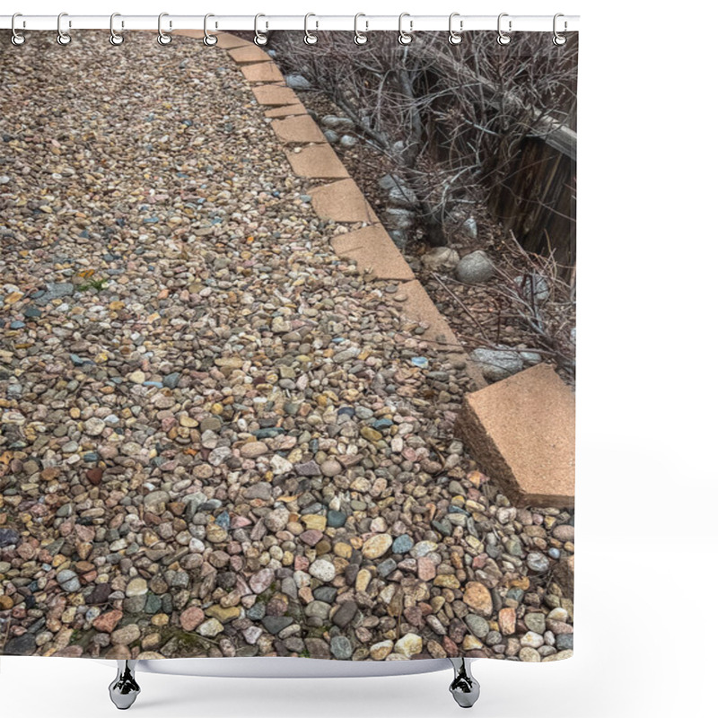 Personality  A Close-up View Of An Aging Retaining Wall Made Of Stacked Concrete Blocks, Surrounded By A Bed Of Decorative Stones In Various Colors And Sizes. The Landscape Shows Signs Of Wear And Is Ready For Shower Curtains