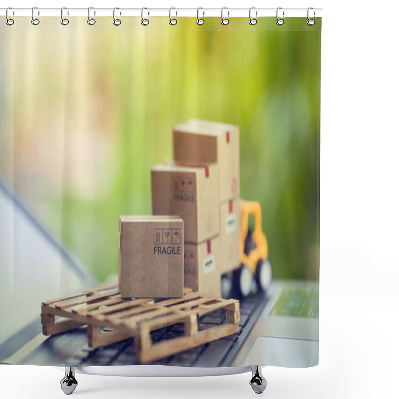 Personality  Logistic And Cargo Freight Concept: Fork-lift A Truck Moves A Paper Box On Notebook Keyboard In The Natural Green Background. Depicts  International Freight Or Shipping Service For Online Shopping. Shower Curtains