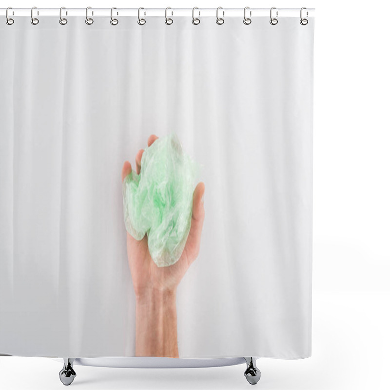 Personality  Partial View Of Man Holding Green Plastic Bag On Grey Background Shower Curtains