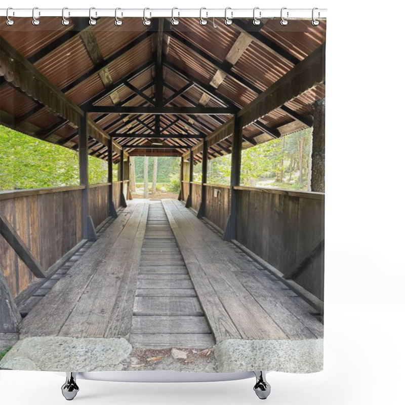 Personality  A Rustic Wooden Bridge Covered With A Shingled Roof Stretches Across A Forest Path. Surrounded By Lush Vegetation, The Bridge Evokes A Sense Of Tranquility And Nostalgia In A Natural Setting. Shower Curtains