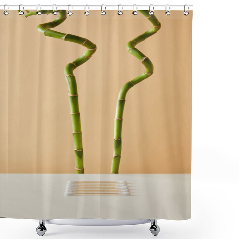 Personality  Ear Sticks On White Table With Green Bamboo On Beige Background Shower Curtains