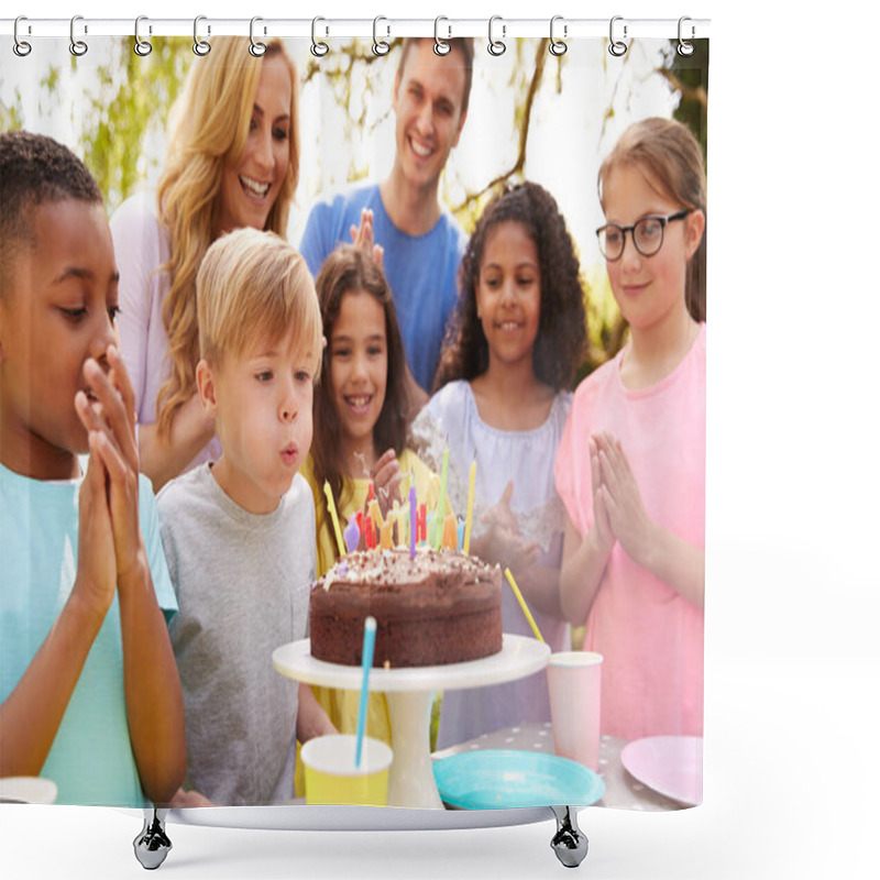 Personality  Boy Blows Out Candles As He Celebrates Birthday With Party For Parents And Friends In Garden At Home Shower Curtains