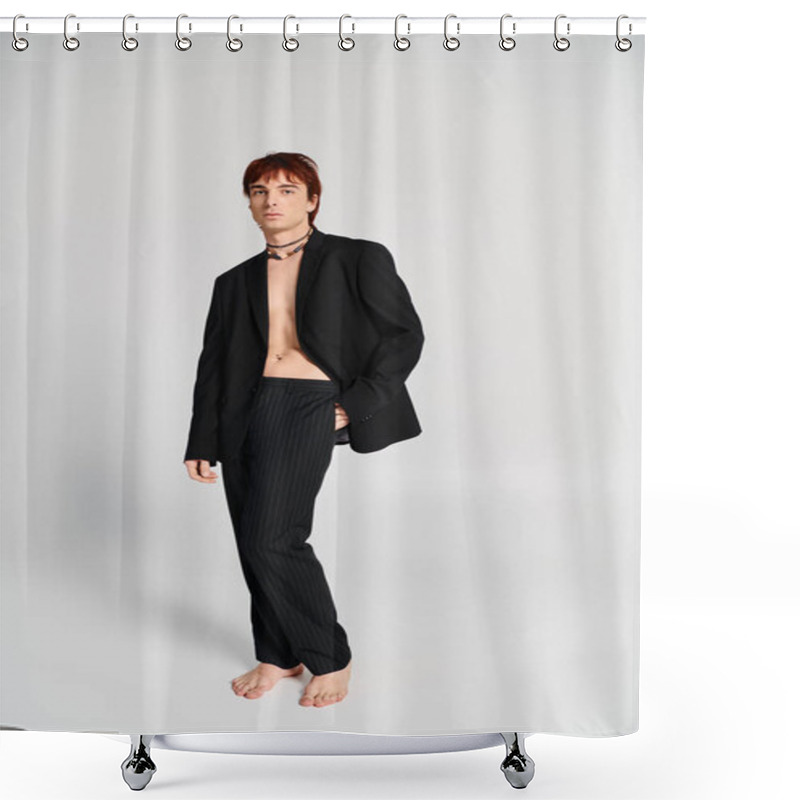 Personality  A Stylish Young Man In A Suit Strikes A Pose In A Studio Setting With A Grey Background. Shower Curtains