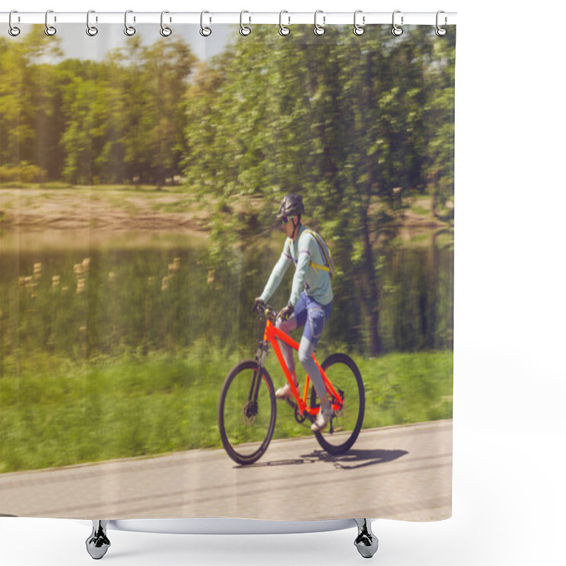 Personality  A Cyclist In A Helmet Rides A Bicycle Path, Motion Blur. Shower Curtains