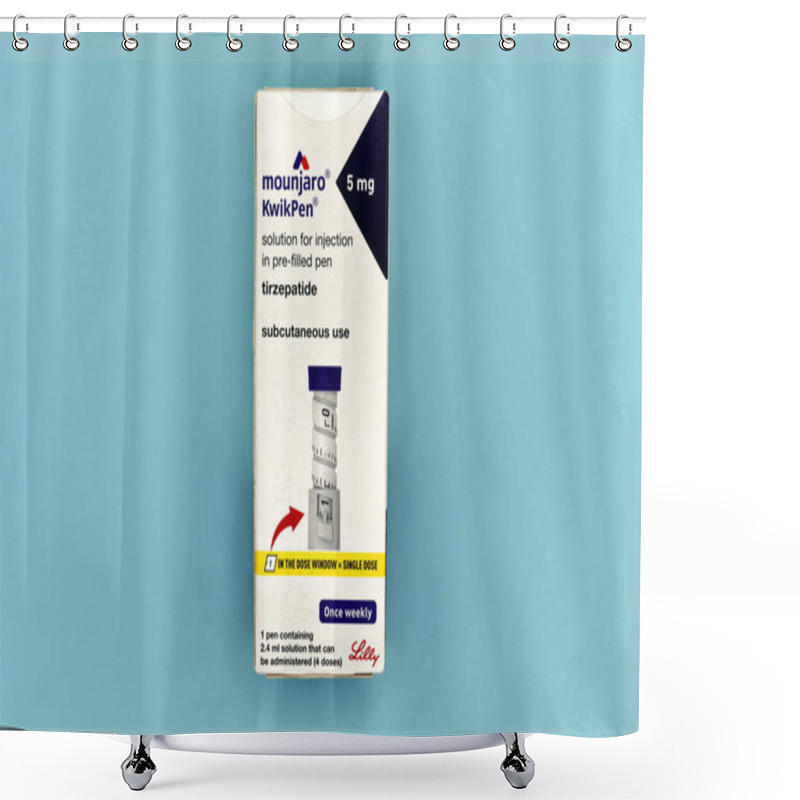 Personality  Warminster, Wiltshire, England, UK - January 16 2025: An Unopened Mounjaro 5mg KwikPen Box On A Plain Blue Background                                                                                      Shower Curtains