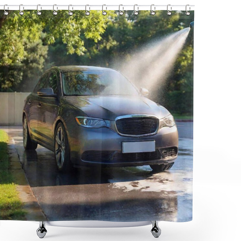 Personality  A High-resolution Ultrarealistic Image Portraying An Outdoor Car Wash Scene, Captured In Photographic Detail. A Person, Out Of Frame, Uses A High-pressure Water Hose To Wash A Black Car, Creating Dramatic Sprays Of Water Illuminated By Sunlight. The Shower Curtains