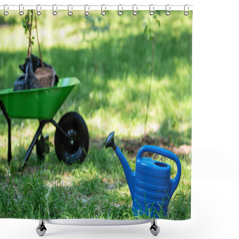 Personality  Selective Focus Of Watering Can In Park With New Trees In Wheelbarrow  Shower Curtains