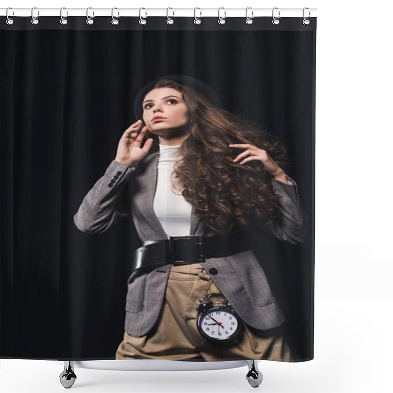 Personality  Low Angle View Of Fashionable Pensive Young Woman With Clock Looking Away Isolated On Black  Shower Curtains