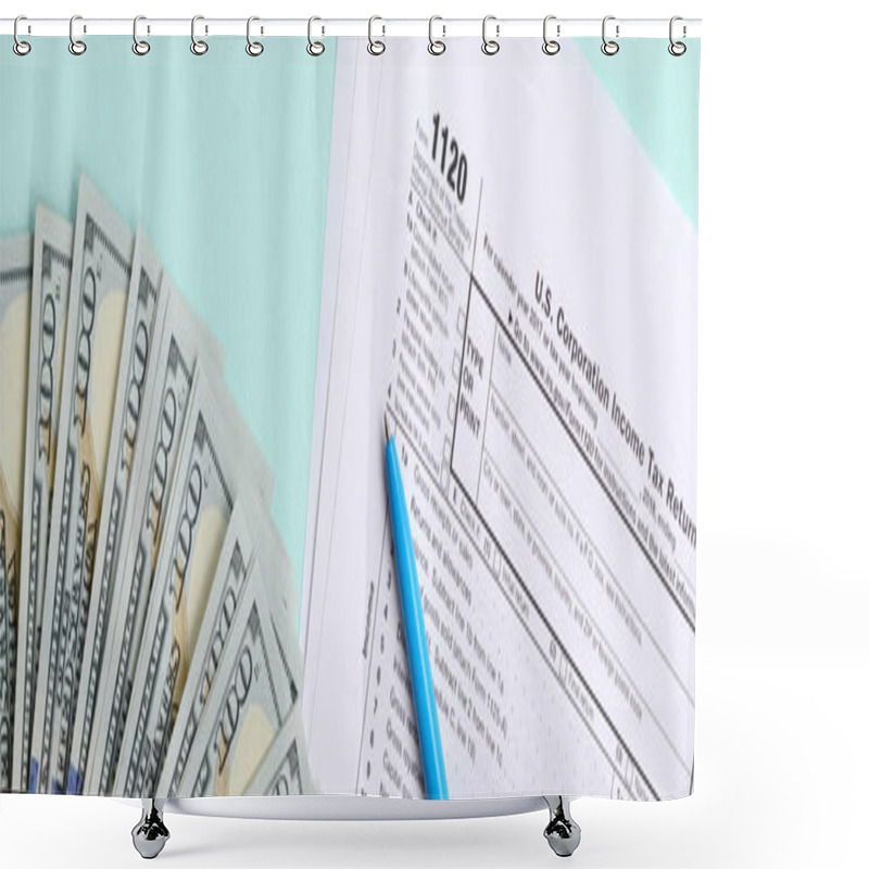 Personality  1120 Tax Form Lies Near Hundred Dollar Bills And Blue Pen On A Light Blue Background. US Corporation Income Tax Return. Shower Curtains