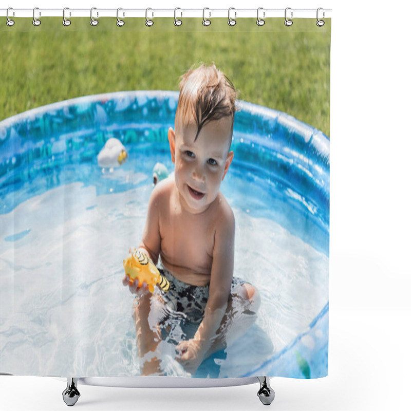 Personality  Positive Toddler Boy Sitting In Inflatable Pool And Holding Rubber Toy  Shower Curtains