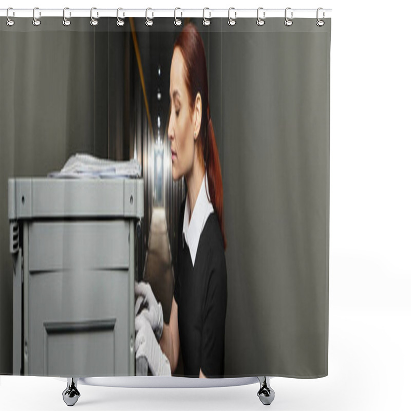 Personality  A Young Woman In A Dark Outfit Inspects A Gray Container In A Narrow Hallway Filled With Light. Shower Curtains