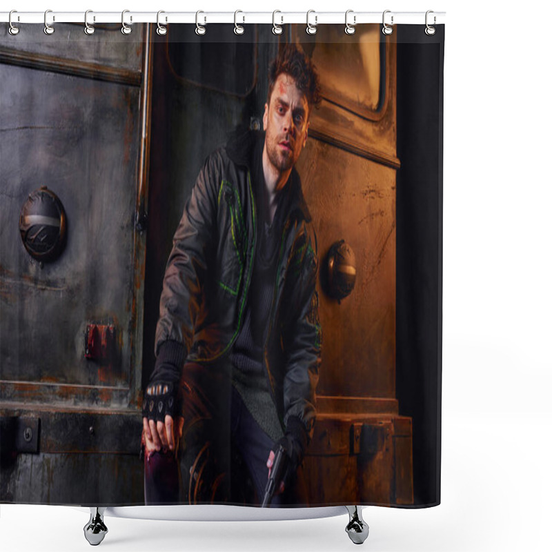 Personality  Injured Man In Worn Jacket Holding Gun And Looking At Camera Near Rusty Carriage In Dark Subway Shower Curtains