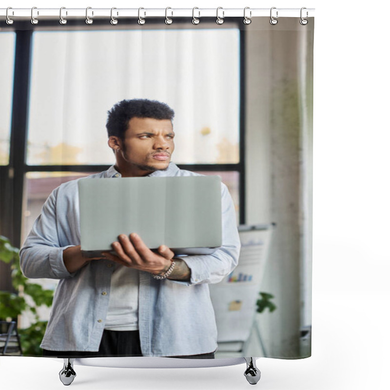 Personality  Man In A Casual Outfit Stands Holding A Laptop, Lost In Thought Amid A Bright Office Setting. Shower Curtains