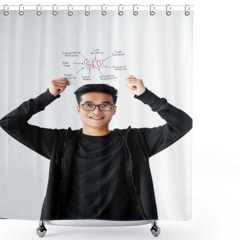 Personality  Smiling Asian Seo Manager Holding Paper With Concept Words Of Seo  Shower Curtains