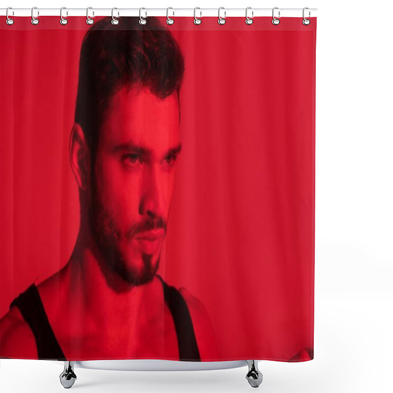 Personality  Close-up Portrait Of Handsome Young Man Under Red Light Shower Curtains