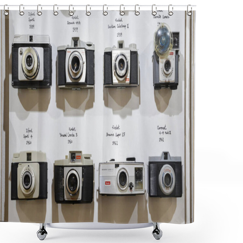 Personality  Vintage Film Cameras Lined Up On Wall In Chronological Order Starting From 1959 To 1961 Showing Technological Evolution Shower Curtains