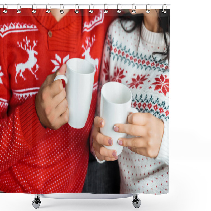 Personality  Cropped Image Of Couple Holding Hot Coffee Cups On Sofa At Home Shower Curtains