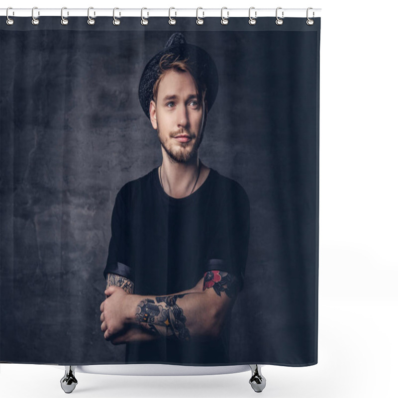 Personality  Portrait Of Handsome Bearded Hipster With Crossed Tattooed Arms, Dressed In A Black T-shirt And Hat. Isolated On A Dark Background. Shower Curtains