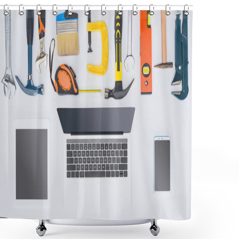 Personality  Top View Of Laptop With Various Tools Lying On White Shower Curtains