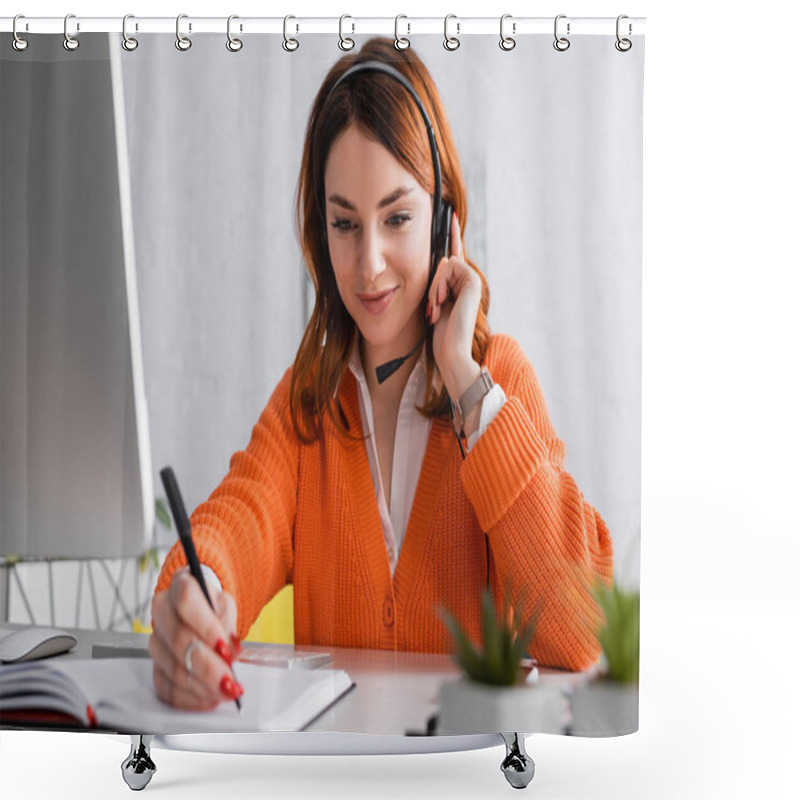 Personality  Smiling Woman In Headset Writing In Notebook While Working At Home Shower Curtains