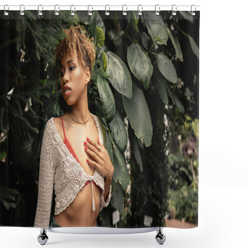 Personality  Young African American Woman In Stylish Knitted Top Touching Chest And Looking Away While Standing Near Green Foliage In Greenhouse, Fashion-forward Lady In Tropical Oasis Shower Curtains