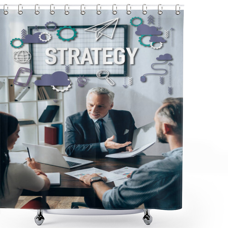 Personality  Smiling Investor Pointing At Paper Folder Near Laptop And Businesspeople With Documents On Blurred Foreground, Strategy Lettering  Shower Curtains