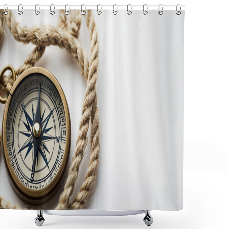 Personality  Classic Compass With A Brass Finish Entwined By A Thick Rope On A White Surface. Shower Curtains