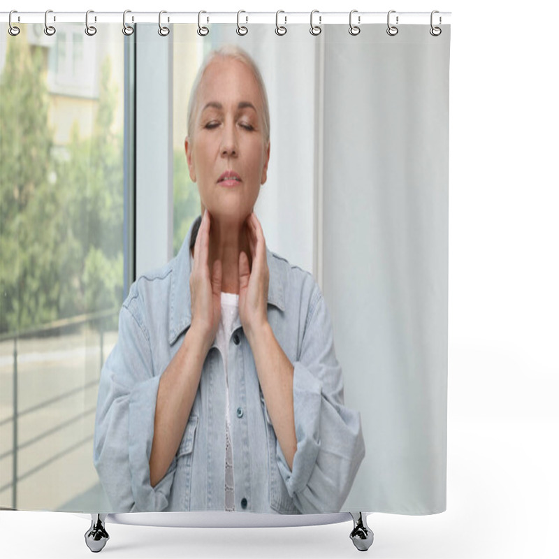 Personality  Mature Woman Doing Thyroid Self Examination Near Window Shower Curtains