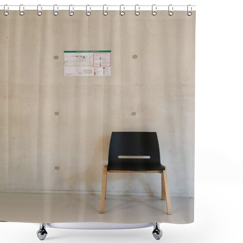 Personality  Minimalist Black Chair Against Concrete Wall With Emergency Exit Map. High Quality Photo Shower Curtains