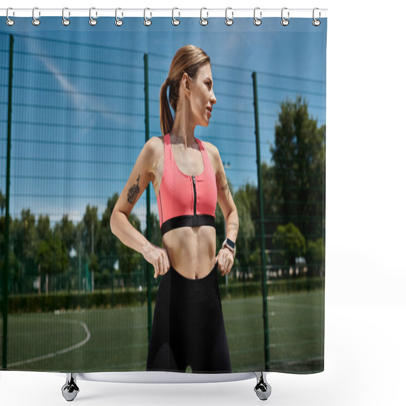 Personality  A Young Woman In Pink Activewear Stands On A Soccer Field, Hands On Her Hips, Looking Determined. Shower Curtains